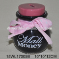 Ceramic coin bank with hanging ornament in bright color